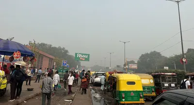 delhi air pollution  working class stays outdoors despite health issues  sees a cut in pay