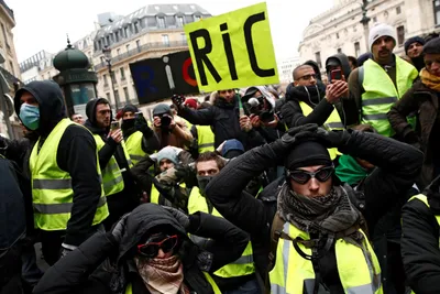 thousands of  yellow vests  hit french streets in fifth saturday of protests