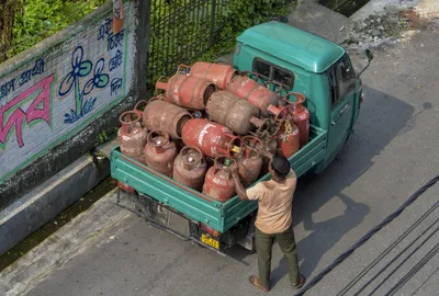 govt repeatedly said aadhaar wasn t compulsory for lpg  now it is pushing it aggressively