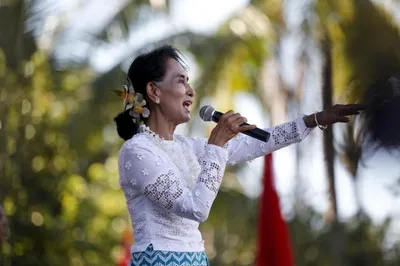 suu kyi to  defend national interest  at genocide hearings in hague