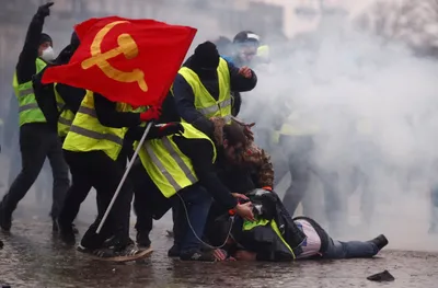 paris   yellow vest  protesters hit with water cannon  tear gas