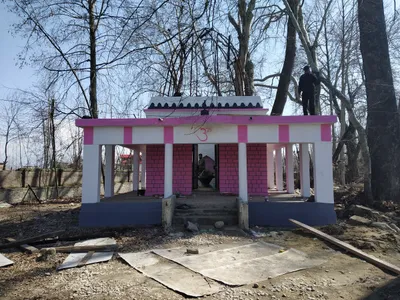 muslims and pandits work together to restore a temple in kashmir