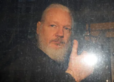 ecuador suspends julian assange s citizenship