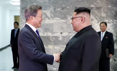 leaders of two koreas hold surprise meeting