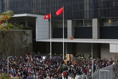 after tough year  hong kong democracy protesters warn china on new year s day