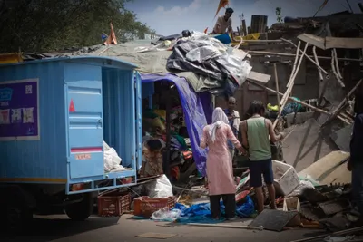 in photos  life behind the curtain  or how delhi s poor see g20 city