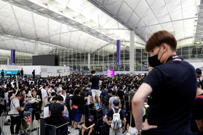 hong kong airport reopens amidst continuing protests