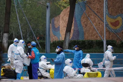 beijing dials up public checks  lockdown measures as covid cases quadruple