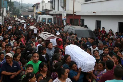 guatemalan volcano eruption kills 69  families continue search for victims