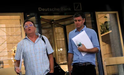 in major restructuring move  deutsche bank lays off thousands worldwide
