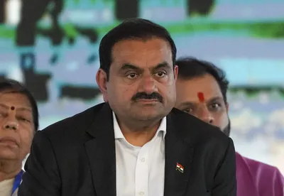  compromised pm struck adani release bargain   opposition on reports that us may drop fraud  bribery charges