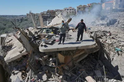 the world watches as israel destroys lebanon  implementing a doctrine of war crimes