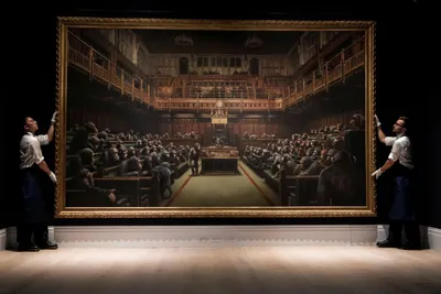 banksy chimpanzee parliament painting sells for  12 million
