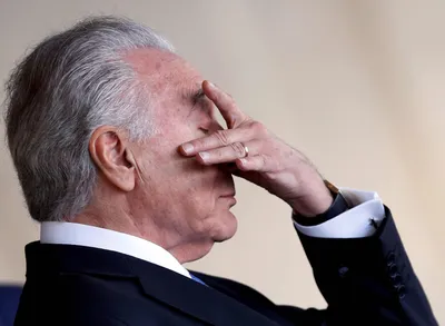 parts brazilian president temer s christmas pardons suspended by top court