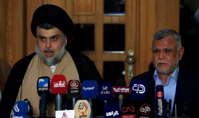 iraq s sadr and amiri announce political alliance