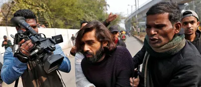 how a red bottle was used to question jamia student s injuries after the shooting