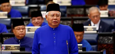 former malaysian pm najib razak to face 21 more money laundering charges