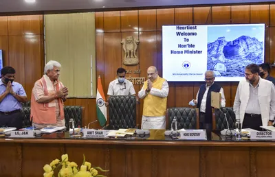 ahead of amarnath yatra  amit shah  other officials review j k security situation