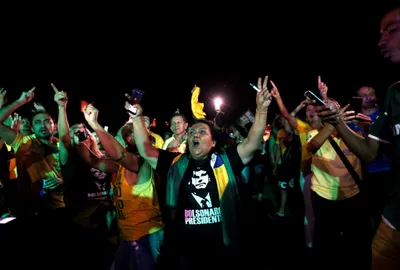 far right  ex military officer bolsonaro to face leftist haddad in brazil presidential runoff