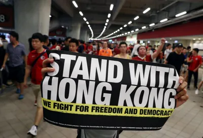 hong kong protesters boo chinese anthem at football match