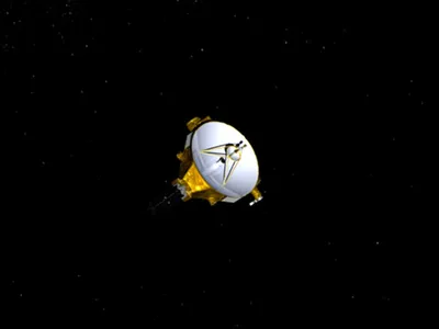 nasa probe believed to have passed distant space rock on landmark mission