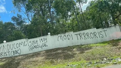 australia  documents released by police point to  hindu hand  in temple wall defacement