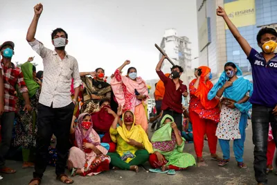 bangladesh threatens to sue factory owners who don t pay workers