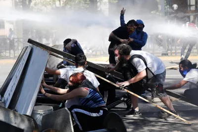 what s behind wealthy chile s deadly protests 