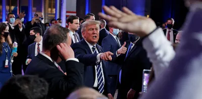 in split screen town halls  trump and biden squabble over coronavirus response