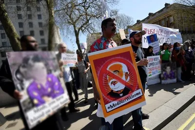  modi go home   angry protesters confront the prime minister in london