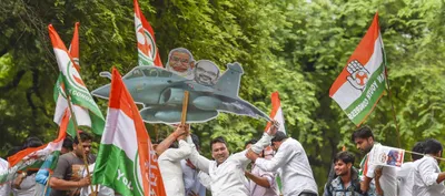 congress accuses pm modi of unilaterally raising price for rafale jets