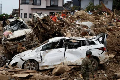 japan flood toll nears 200  several dozen remain missing