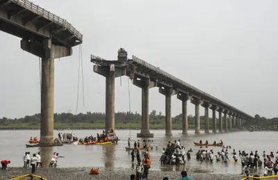 at least 13 dead as bridge collapses in gujarat