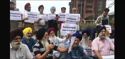 as local body polls proceed  minorities in kashmir speak up in favour of article 35a