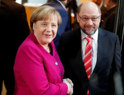 merkel optimistic for the grand coalition revival
