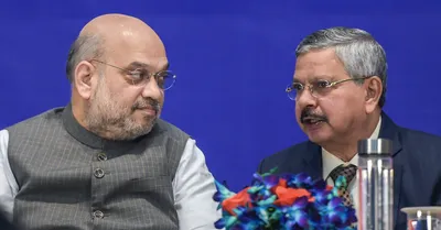 amit shah  once accused in fake encounter cases  chief guest at rights body event