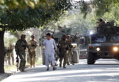 suicide bomber and gunmen hit eastern afghanistan government office