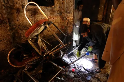 suicide bomber kills 12 including election candidate at anti taliban party rally in pakistan