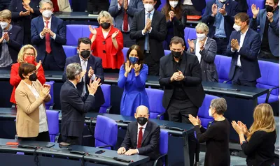olaf scholz takes over as german chancellor  ending merkel era