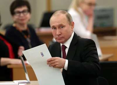 putin handily wins another six year term  firms grip on russia