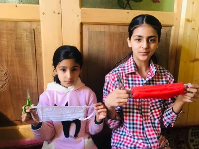 10 year old kashmiri  worried over short supply  on a mission to handcraft protective masks