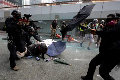 hong kong files charges against teenager shot by police
