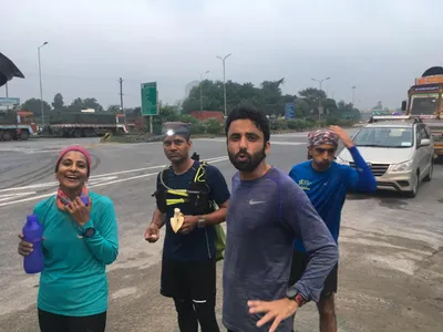 ‘one foot in front of the other’  four runners build their utopia on the road