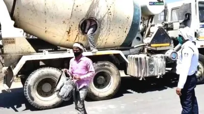 police find 18 migrant workers travelling to up from mumbai in concrete mixer truck