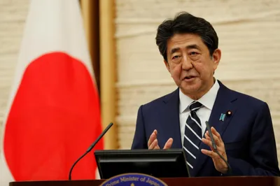 shinzo abe  stepping down or just stepping back 