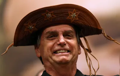 right wing brazil candidate bolsonaro commits to free press after calling it  trash 