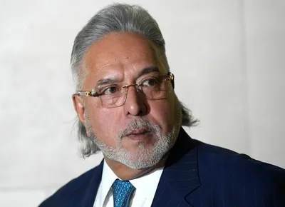 vijay mallya shrugs off seizure of british assets in his name