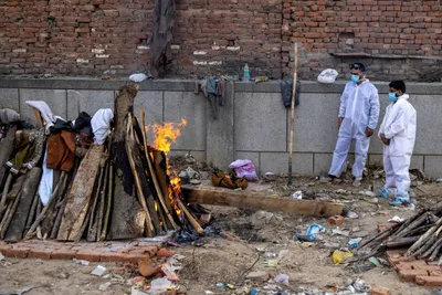 mass cremations begin as delhi faces deluge of covid 19 deaths