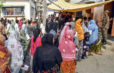 morning sees high turnout in bengal  voting largely peaceful despite scattered flashpoints