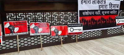 opposition  activists join hands in protest against rti amendment bill